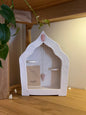 WHITE HOME-SHAPED CERAMIC ALTAR WITH TWO CANDLE HOLDERS, ROSE QUARTZ & ROSE QUARTZ PENDULUM – STAMPED